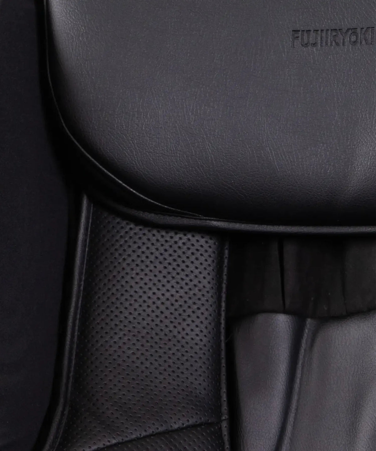 Close-up of the Fujiiryoki JP-2000 black massage chair featuring high-quality upholstery and precision-engineered Japanese massage technology.