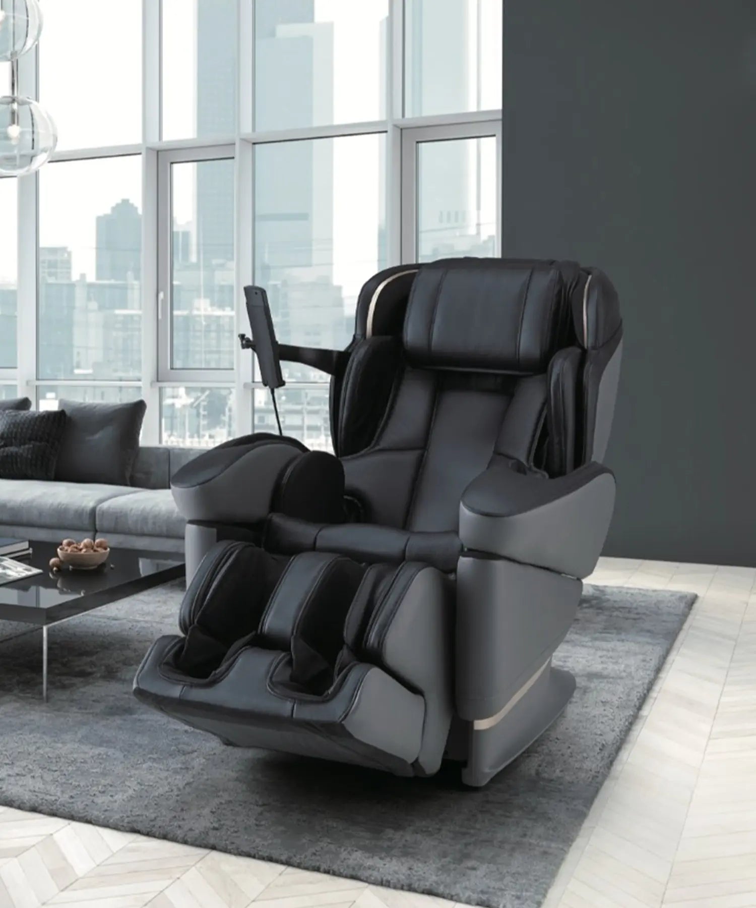 Fujiiryoki JP-3000 black massage chair with intelligent body scanning and heated back massage for tailored full-body relaxation.