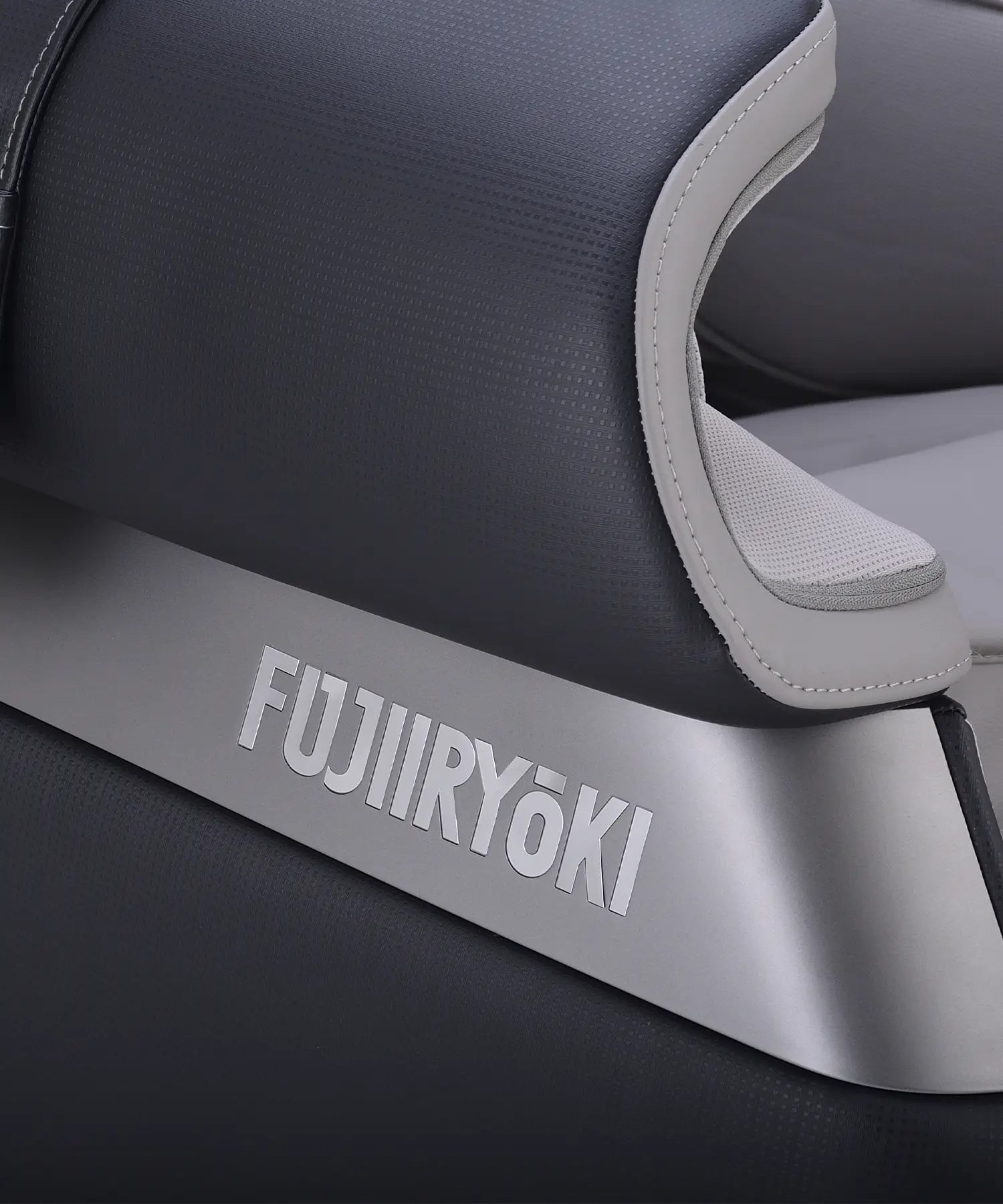 Detailed view of Fujiiryoki Calm Plus in Black, emphasizing high-quality upholstery, advanced massage mechanisms, and sophisticated Japanese design for home wellness