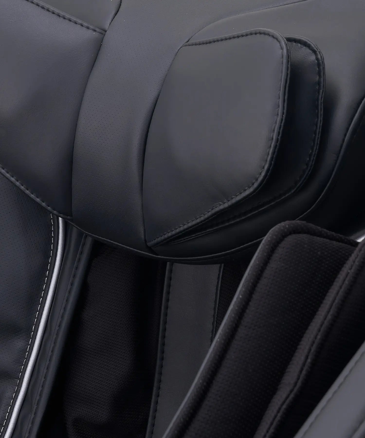 Detailed close-up of the Fujiiryoki Relax PRO massage chair, highlighting the internal roller system and precision-engineered components used for consistent full-body massage